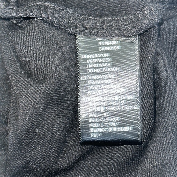 Black bodycon sleeveless dress with lace on shoulders and rushing on left side. - Picture 4 of 4